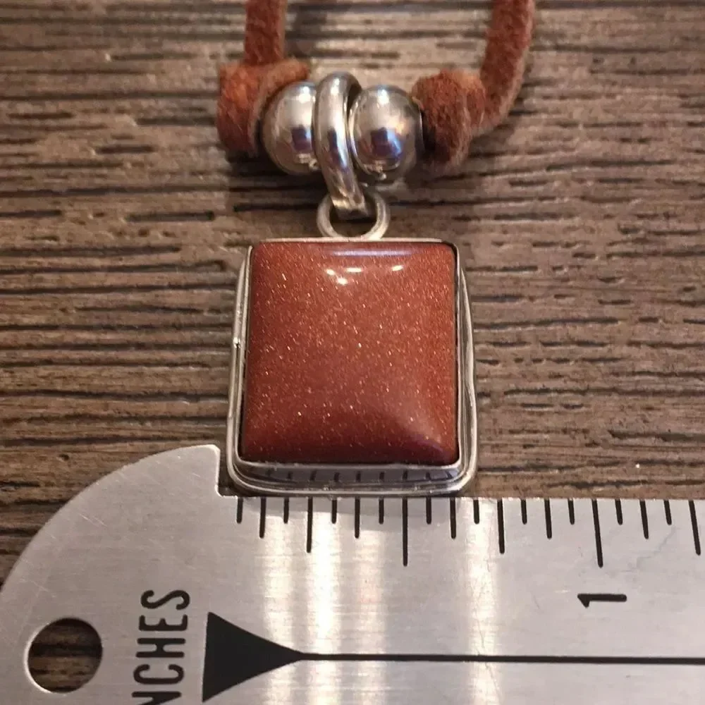Sterling Silver Goldstone Pendant on Leather Cord